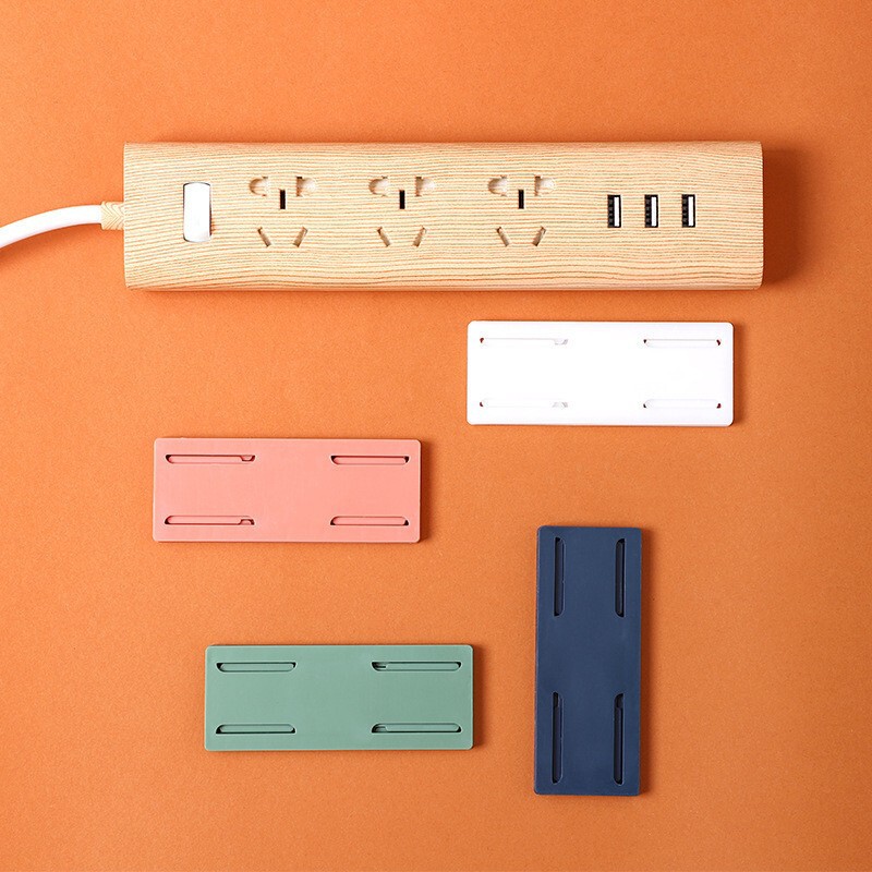 Plug strip holder, traceless adhesive cable organizer, wall-mounted fixture for organizing and storing routers, sockets, and power strips Plug strip holder, traceless adhesive cable organizer, wall-mounted fixture for organizing and storing routers, sockets, and power strips