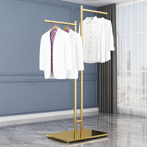 Clothing store display: freestanding island racks, men's and women's clothing racks, garment shelves, and kid's clothing hangers.