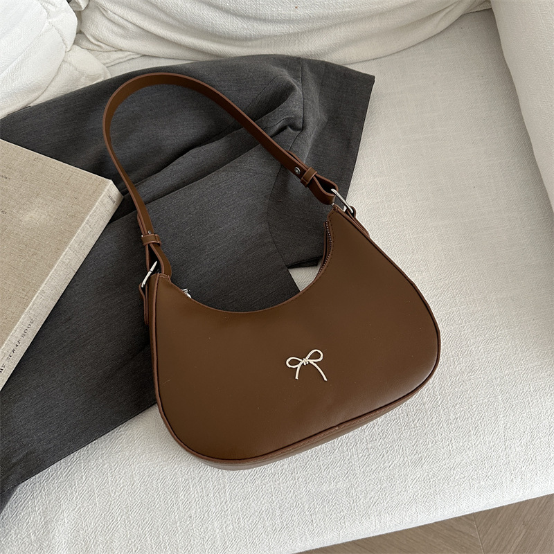 2024 nuevo este año bolsos populares de moda de mujer alta sensación de hombro bolso de brazo nicho de diseño bolso de bolso de bolso