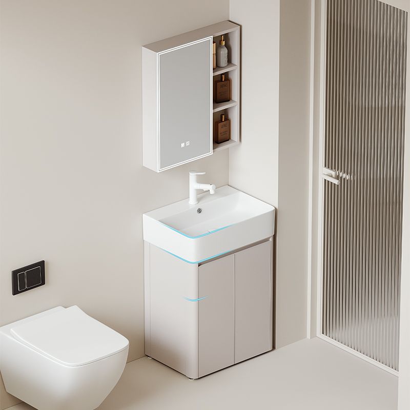 Crema pequeño apartamento gabinete de baño piso combinación espacio engrosado panal lavabo de cerámica integrado