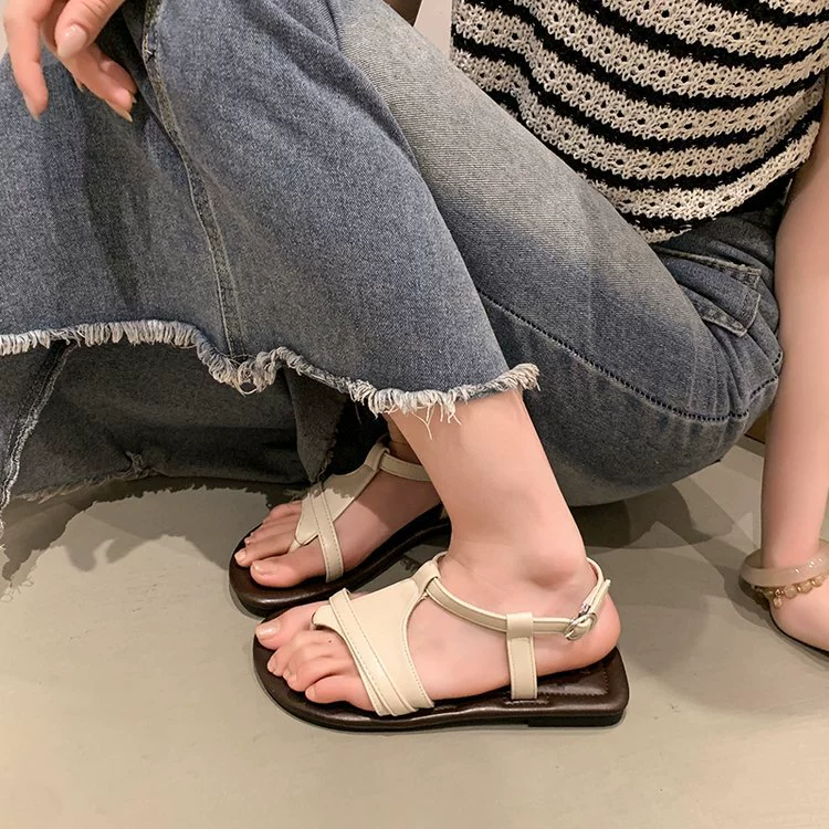 Flat sandals for women summer 2025 new style versatile fashionable flip-up beach shoes one-line buckle Roman shoes