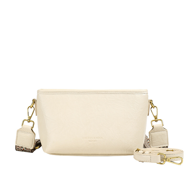 Bolsa de comercio exterior ultra caliente para mujeres 2025 nuevo bolso de hombro casual universal de alta calidad con una correa de hombro ancha bajo la braza