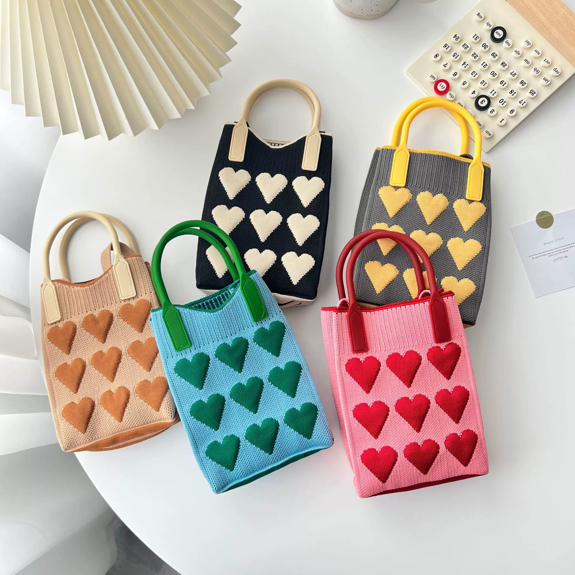 新款爱心卡通小手提包韩版百搭单肩斜跨包针织手机包女出游零钱包