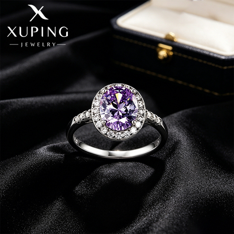 Xuping estilo lujoso temperamento ligero huevo de paloma anillo de aleación de cobre incrustado con gemas artificiales geometría elíptica anillo elegante