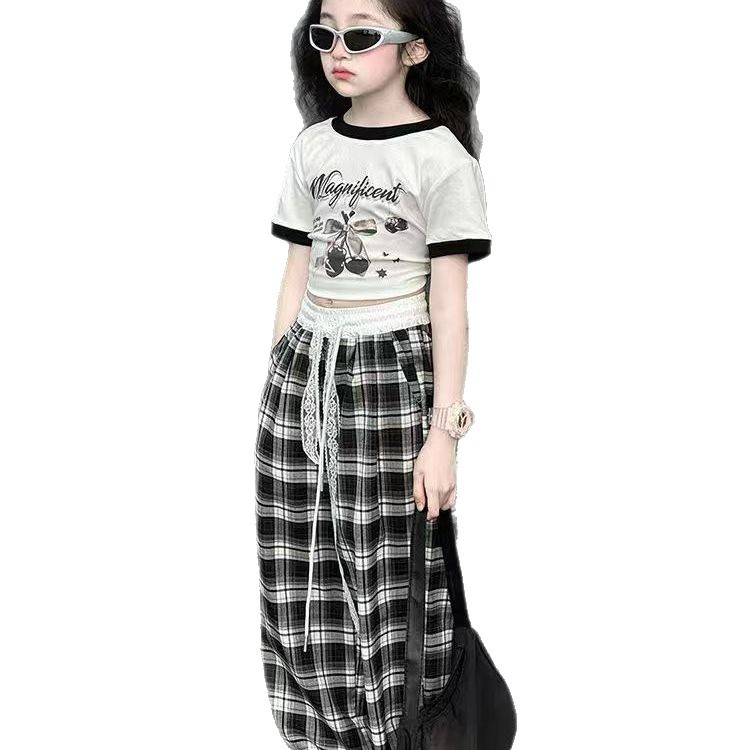 Traje de niña 2025 nuevos niños verano estilo occidental moda dibujos animados manga corta casual niños grandes pantalones de pierna ancha dos piezas