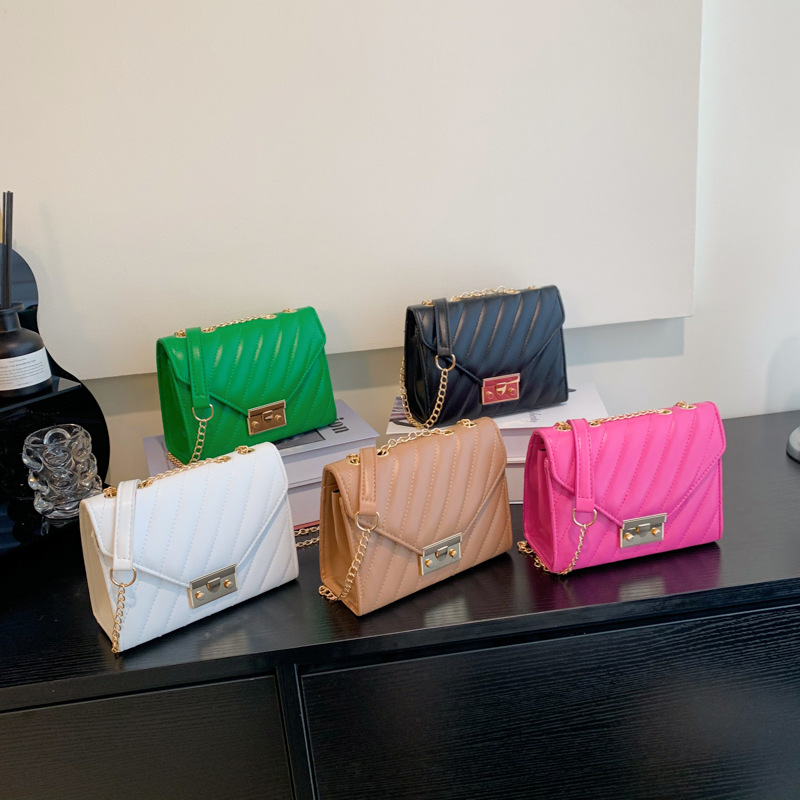 Bolso de costura de automóvil para mujeres fresco estilo exterior bolso de color sólido 2025 moda nueva bolsa de cinturón de cerradura de primavera