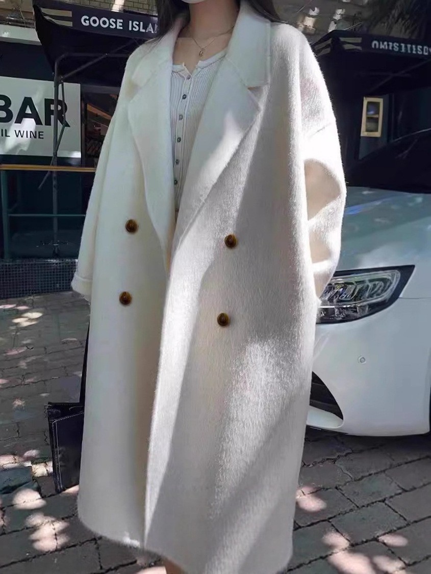 背の高い【韓系の怠惰でシンプルな繭型】ハイエンドの韓国版の通勤両面のウールの女性の長いタイプの毛のコートです。