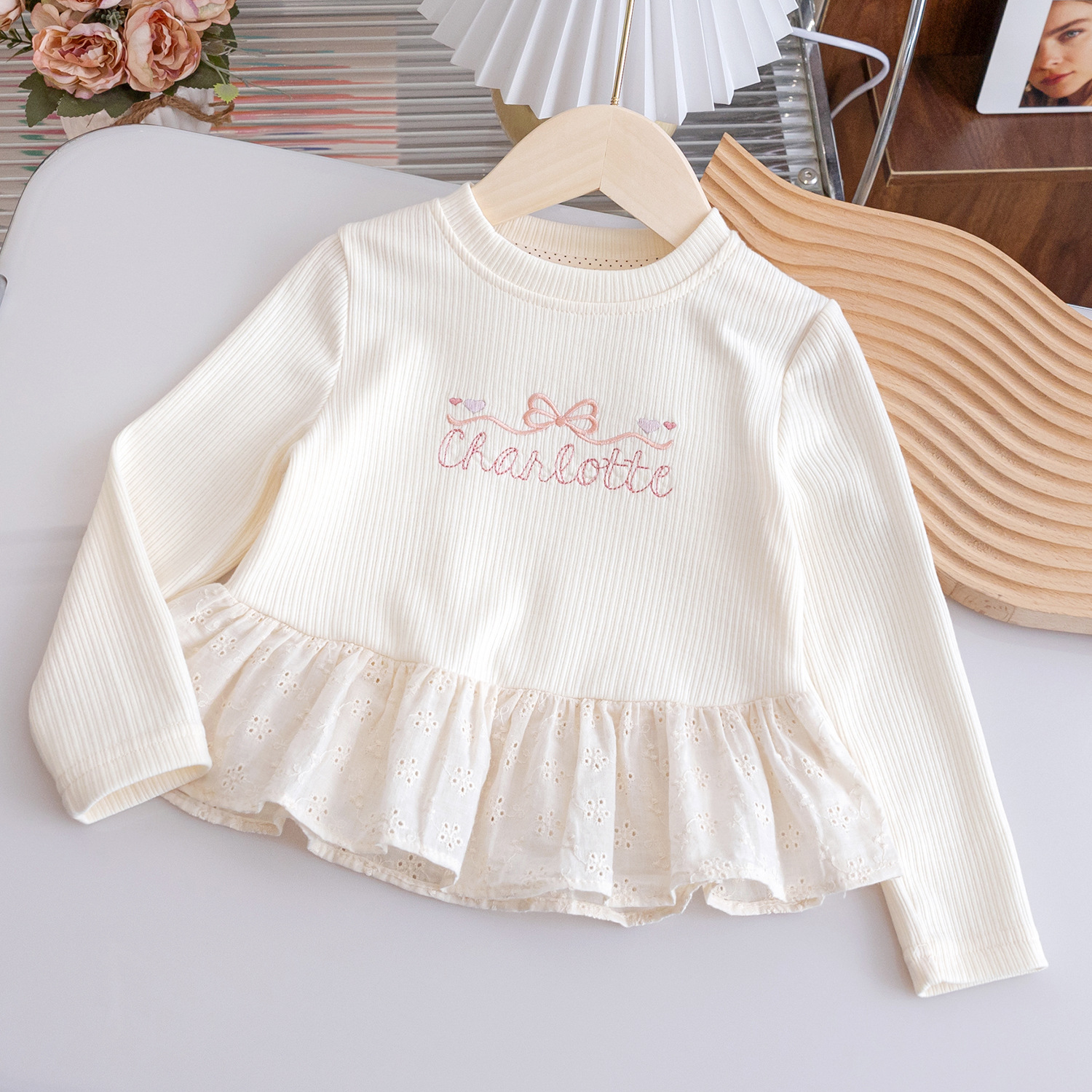 Off-white/no hemming at neckline