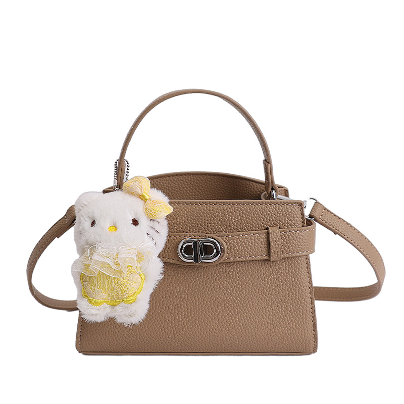 Textura de alta calidad nicho bolso de mano pequeño bolso de mujer nuevo ligeramente lujoso estampado lichi bolso Kylie bolso de mochila de estilo exterior