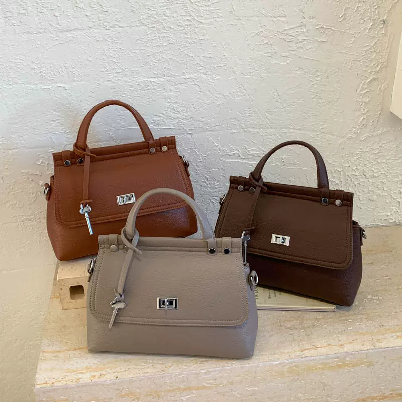 跨境韩系简约锁扣邮差包女包2026新款时尚复古手提包单肩斜挎包批