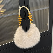 毛毛包包女2026新款小众单肩腋下包毛茸茸手提包毛绒水桶包时尚包