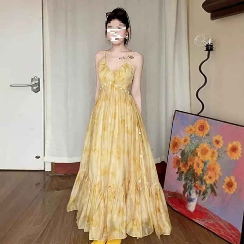 法式黄色碎花吊带连衣裙子女2025夏季新款高级感海边度假气质长裙