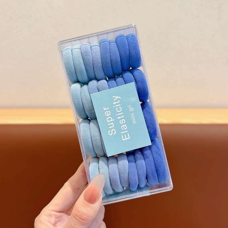 2025 nuevo anillo de cabello para niños de color sólido grueso toalla gruesa cuerda de cabello no es fácil de romper elástica cola de caballo tocado de banda de goma