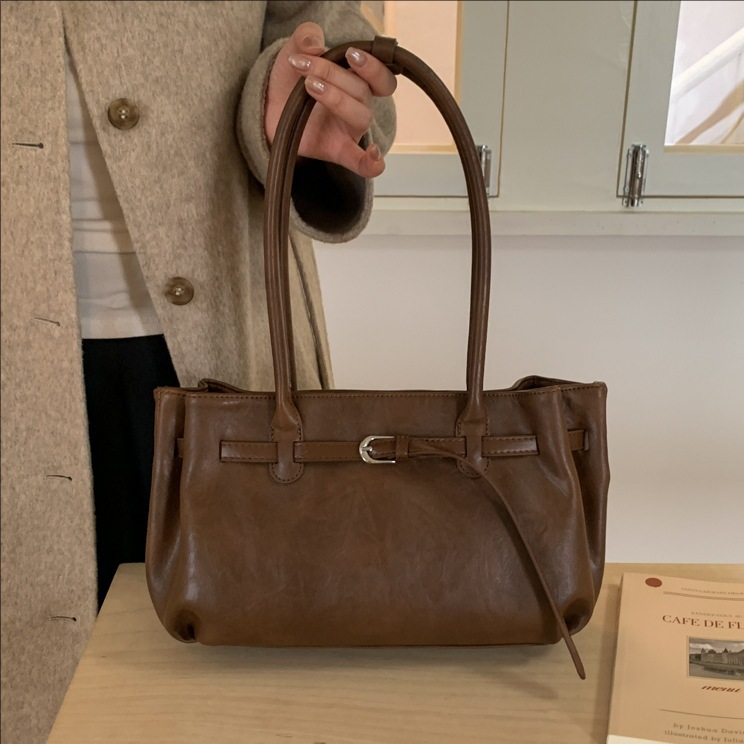Bolsa de gran capacidad para mujeres otoño y invierno 2025, nuevo estilo coreano de moda retro bolso de hombro para llevar a cabo el trabajo.