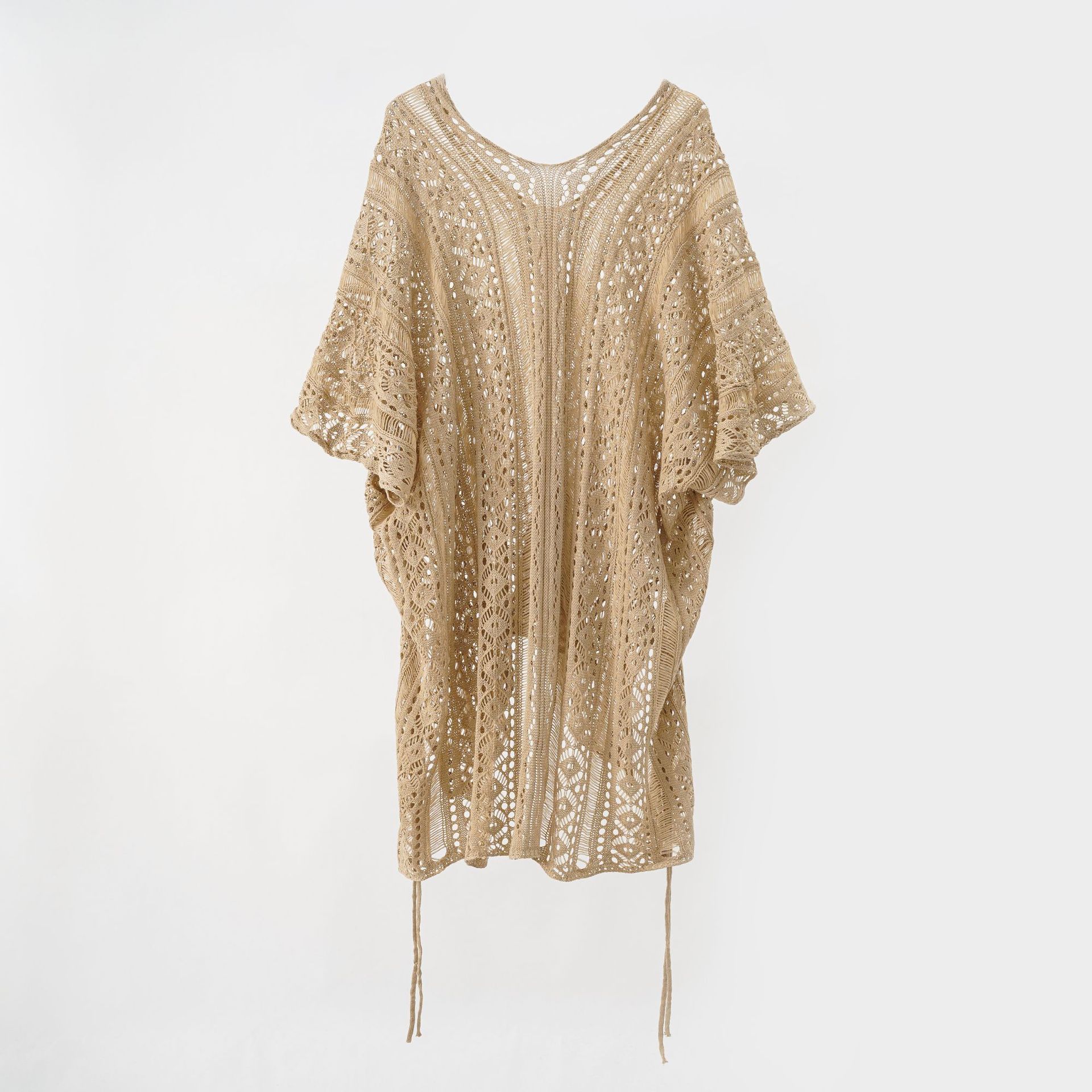2024 nuevo cardigan de punto de color sólido vacaciones de playa moda sexy viento abrigo solar camiseta con chal hueco