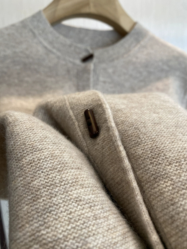 Woolen autumn cardigan with a round collar