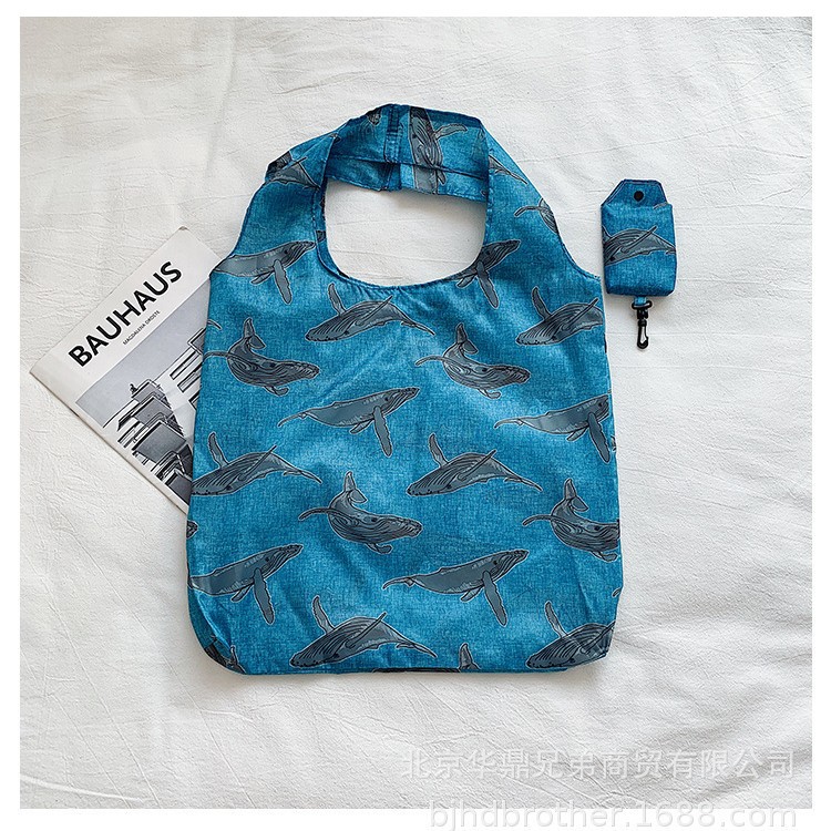 Folding handheld shopping bag