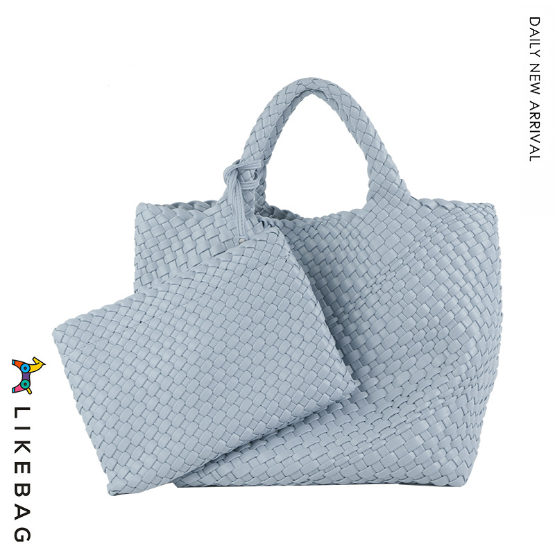 Bolso de mano de viajero de negocios transfronterizo bolso de mano de gran capacidad tejido PU 2022 nueva moda casual tejida Madre y niño bolsa