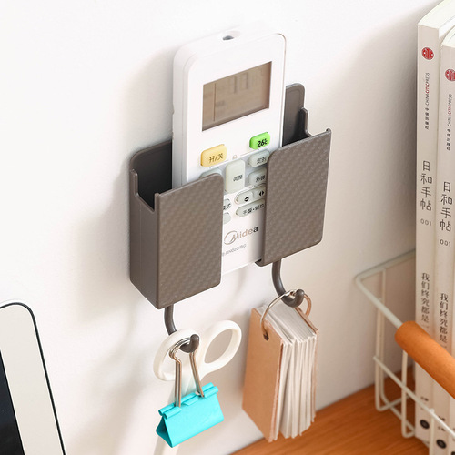 TV air conditioner remote control storage box wall hanging bedside mobile phone storage punch-free storage rack hook wall hanging rack