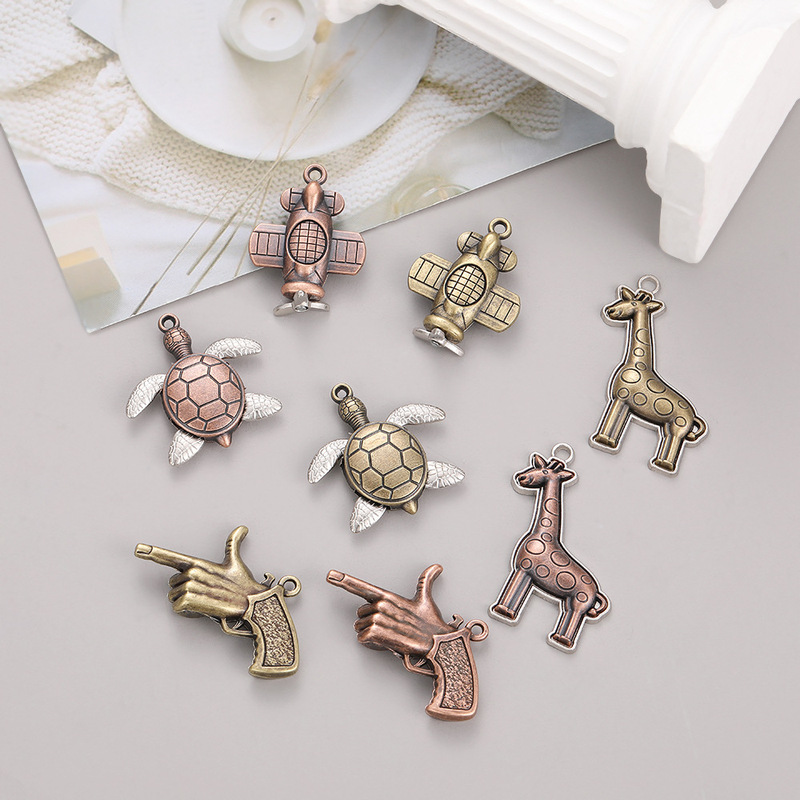 Alloy fashion animal turtle plane personality creative key ring pendant wholesale trend hip hop niche male jewelry
