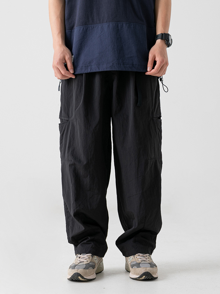 Pantalones casuales de ropa de trabajo de tela antisalpicaduras ligeramente arrugadas para hombres 2025 primavera nuevo cinturón con hebilla pantalones largos funcionales al aire libre