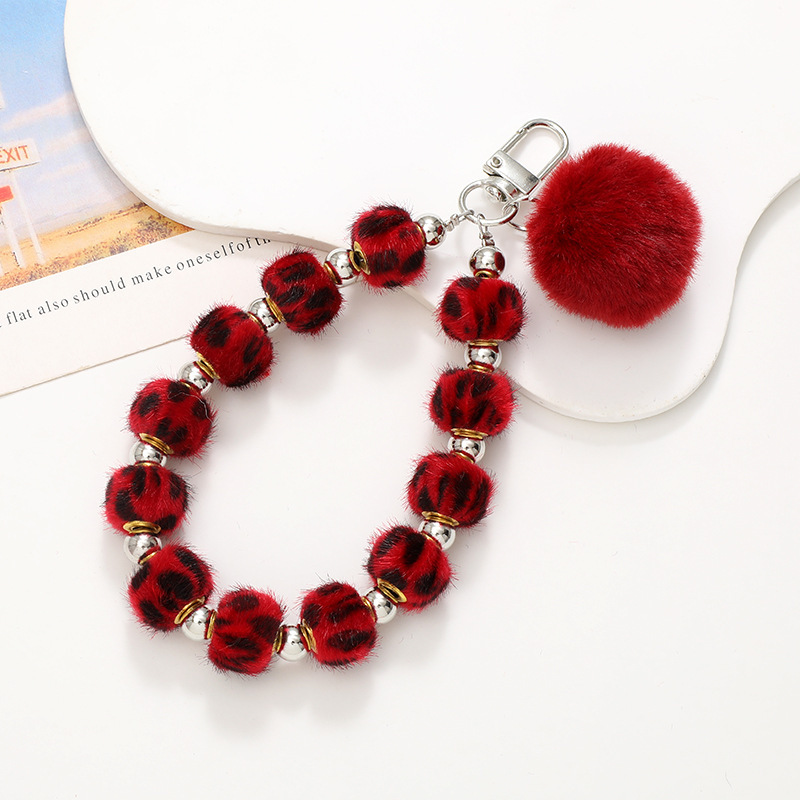 Nuevo Otoño e Invierno de moda ins Bola de piel teléfono móvil colgante teléfono Shell colorido con cuentas de felpa correa de muñeca conveniente correa de mano