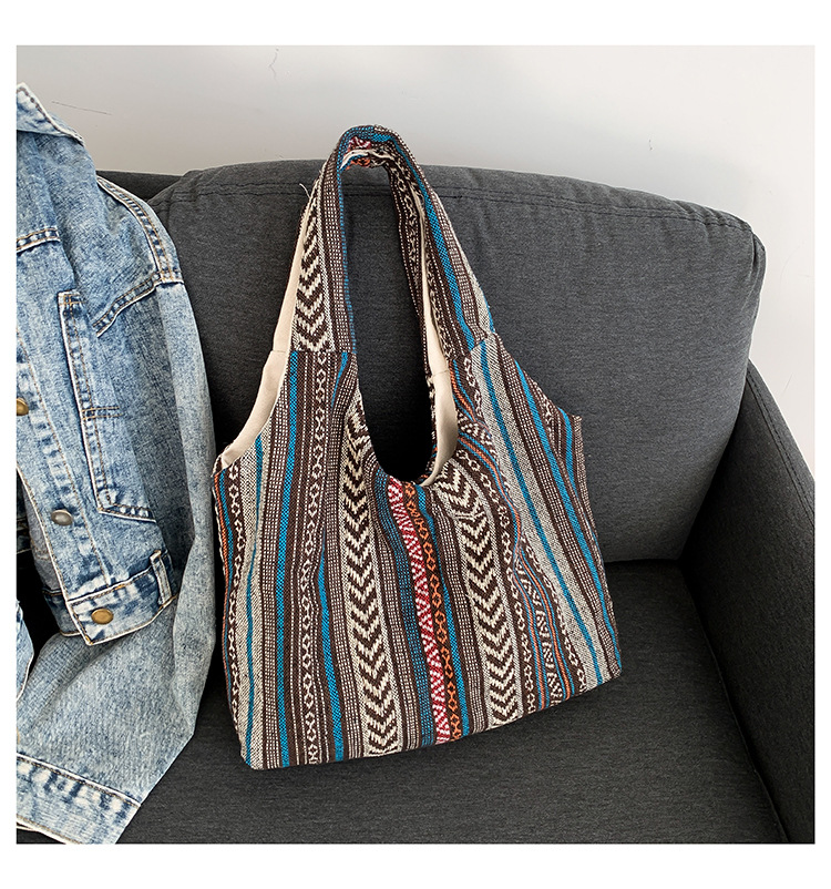 Estilo chino artístico de moda simple bolsa de mujer 2024 invierno nuevo estilo occidental todo partido hombro axila bolsa abierta