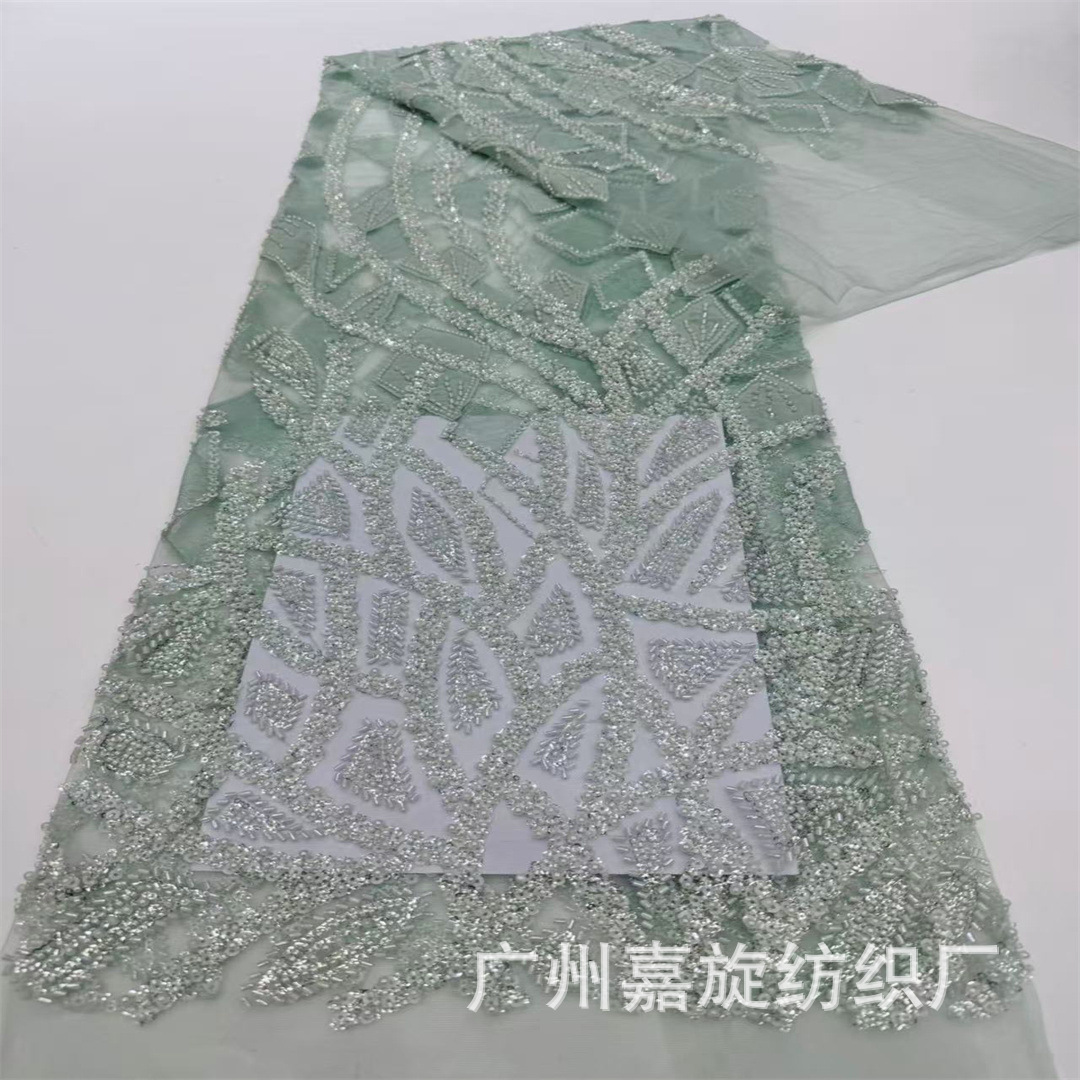 Geometría irregular tubo largo pequeño lenteja tela de encaje cuentas de clavado tela bordada vestido de boda cheongsam tela de moda