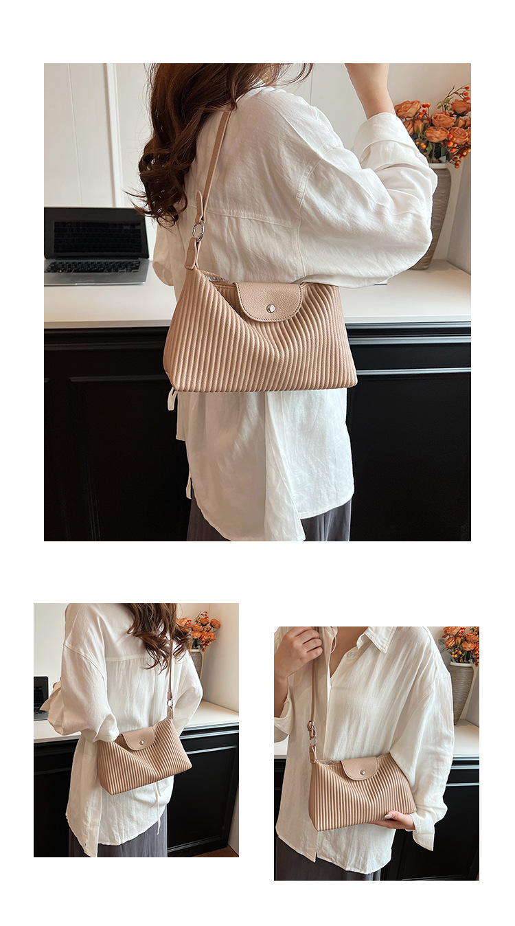 Niche design pleated striped 2024 new women's versatile and simple single shoulder pillow crossbody armpit bag_voghion.com
