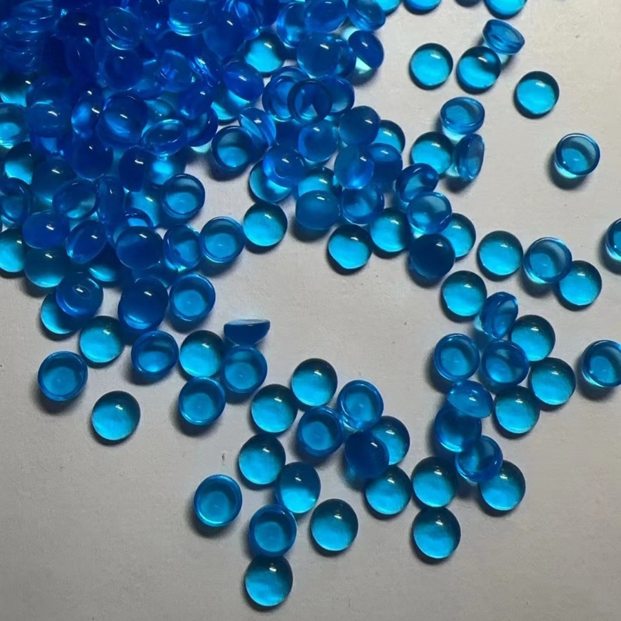 Synthesized glass blue green gemstone
