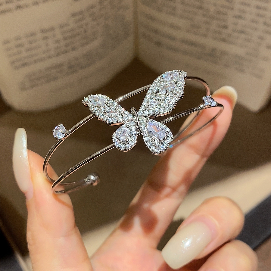 El temperamento francés arco de zircon pulsera de doble capa dulce ins pulsera de viento lujoso ligero de alto nivel sensación de joyas versátiles para mujeres