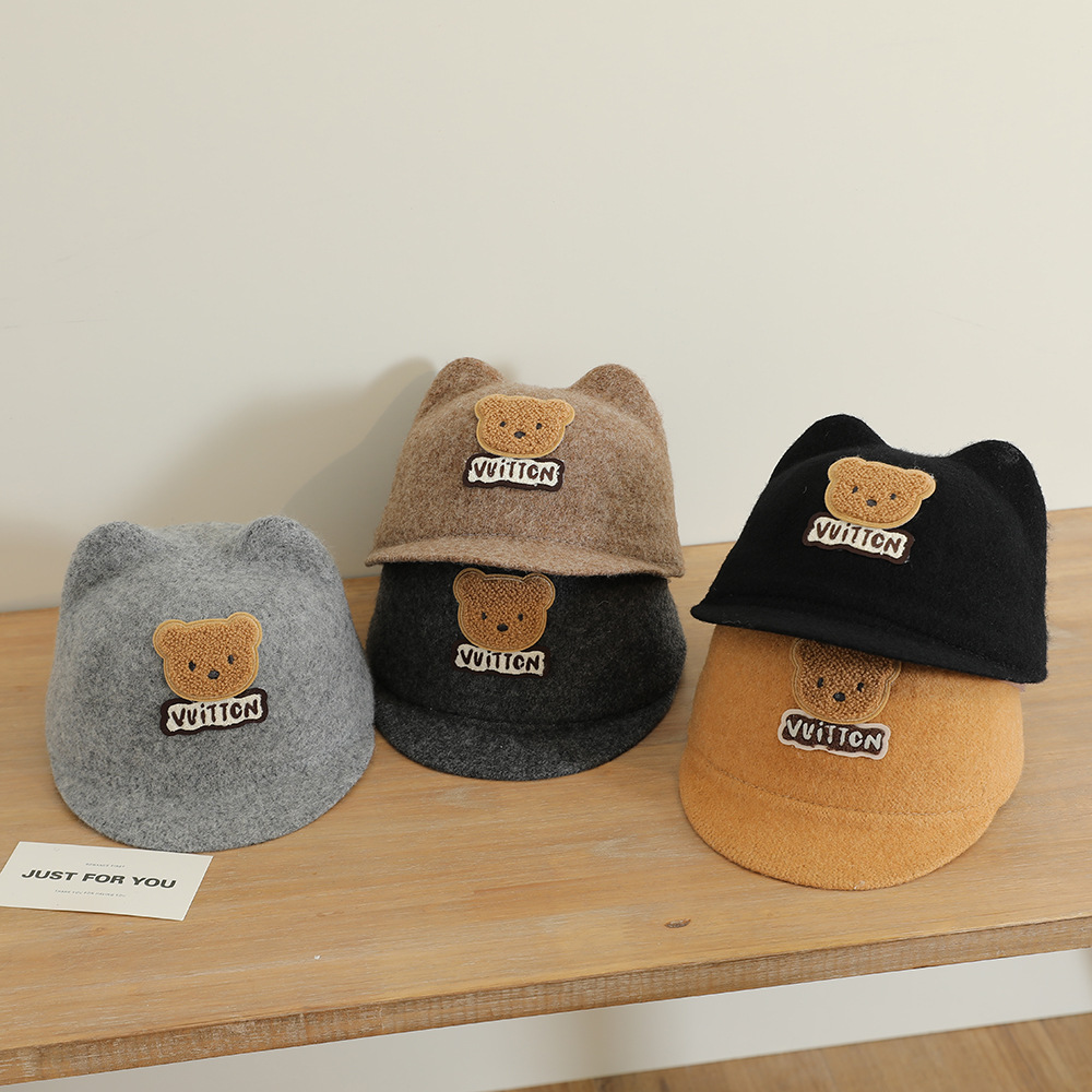 La nueva gorra de orejas de oso lindo y súper lindo niño coreano bebé masculino y femenino otoño e invierno cálido sombrero de copa de lana
