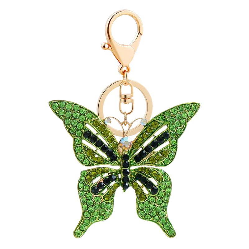 Estilo coreano moda color diamante serie completa aleación hueco mariposa llavero colgante bolsa de accesorios regalo al por mayor