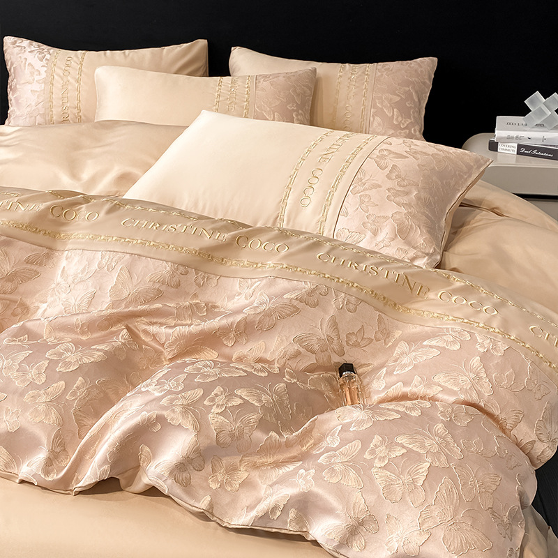 Juego de cuatro piezas de cama jacquard de seda de hielo de verano 2025 nueva funda de edredón de sábana fresca ropa de cama de alta gama de lujo ligero