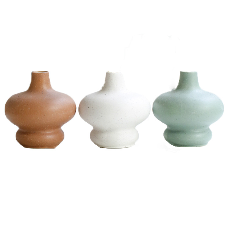 Jarrones de cerámica de estilo europeo, jarrones decorativos para sala de estar, flores secas, arreglos florales, jarrones creativos al por mayor