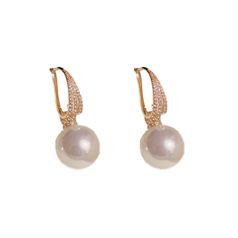 Pendientes de perlas de estilo coreano 2023 nuevo diseño de nicho de dos piezas de moda Super Flash pendientes populares online