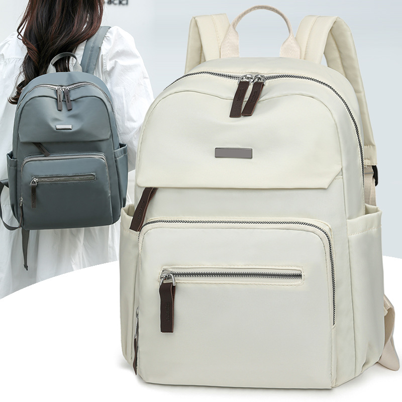 Nueva mochila casual para mujer, mochila escolar de nailon de gran capacidad para estudiantes, mochila de viaje ligera de todo fósforo al aire libre al por mayor