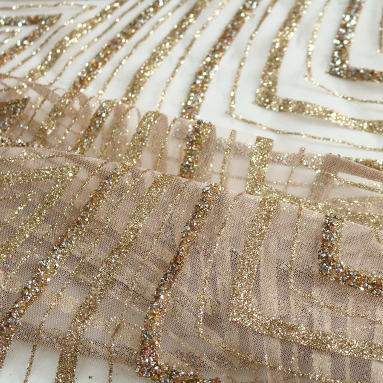 2026 nuevo gaza de malla primavera y verano in stock gaza de malla encaje rociado oro diamantes vestido de boda tela al por mayor