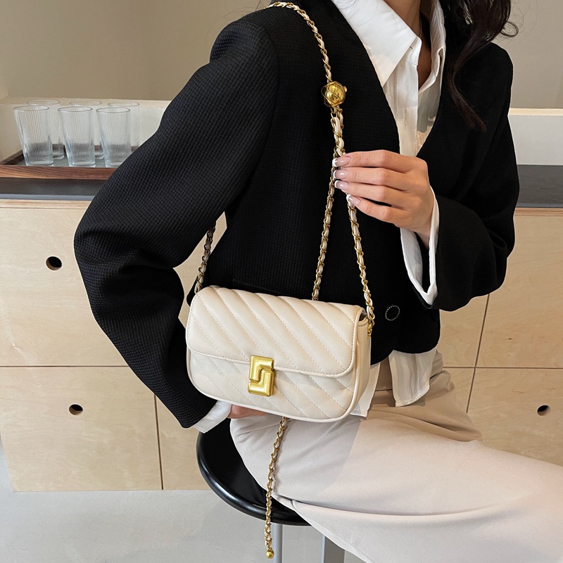 Borsa a tracolla piccola da donna, elegante e versatile, con catena di diamanti, modello 2025, di lusso, di nicchia e di alta gamma._voghion.com