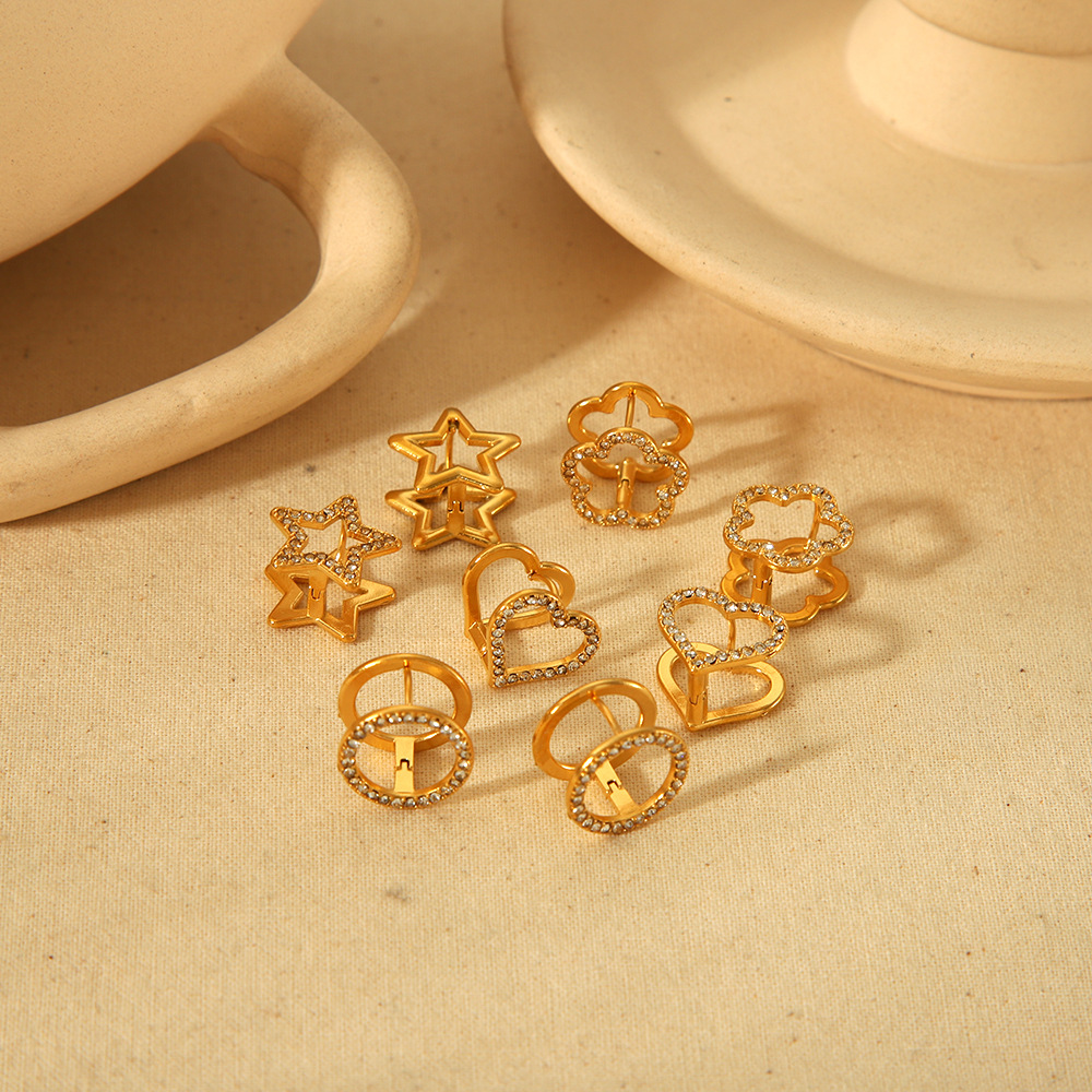 Nicho de diseño transfronterizo europeo y americano de acero de titanio 18k oro acero inoxidable orejas joyerías pentagrama lujoso ligero