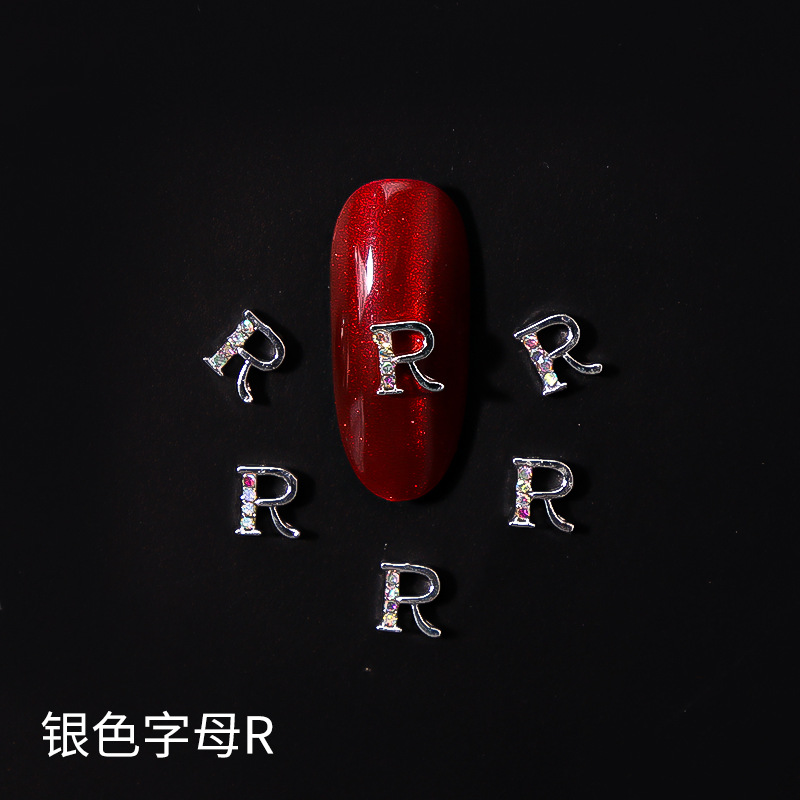 Nueva LZ manicura 26 letras aleación joyería estilo japonés Internet celebridad plata letras manicura joyería clavo Taladro