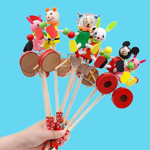 Cartoon wooden man rocking drum children's rotating drum rocking hand drum new exotic puppet toy rotating drum stall