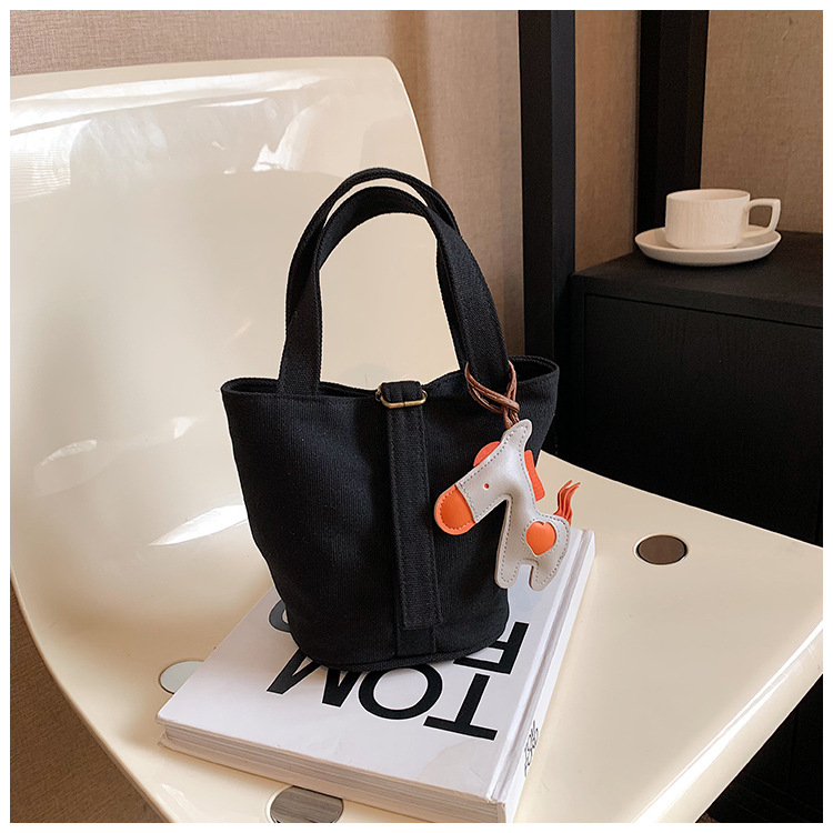 Bolso de mezclilla lindo de los niños de las mujeres 2023 Otoño Nuevo estilo coreano bolso de cubo de tela de color sólido para niños