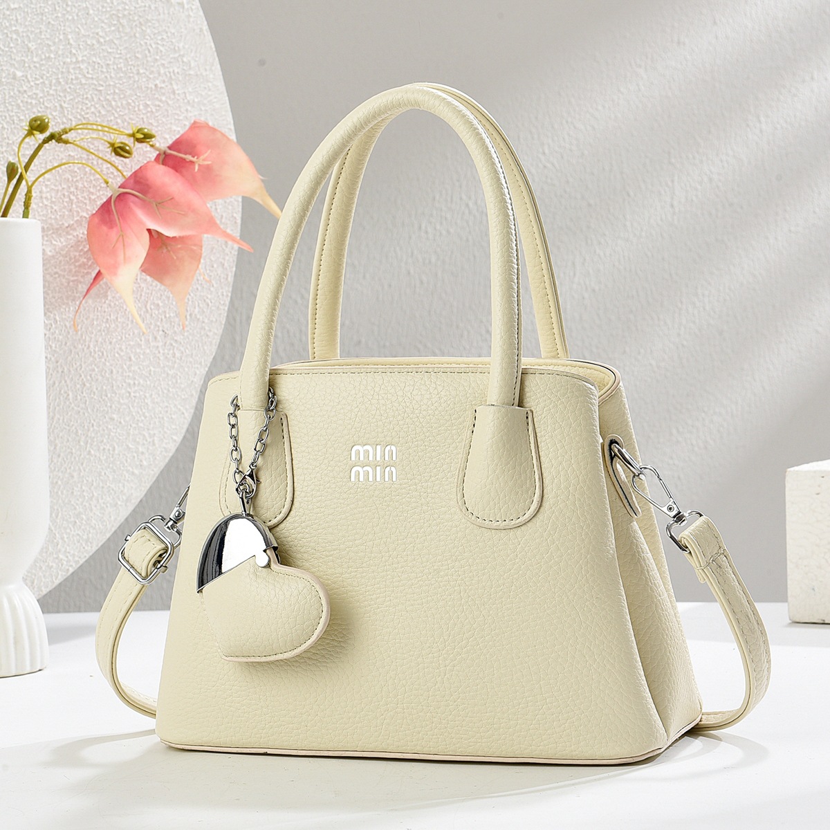 Regalo cálido bolso de mujer bolso de mano mujer 2025 nueva moda atmósfera dama de mediana edad enviar bolso de madre