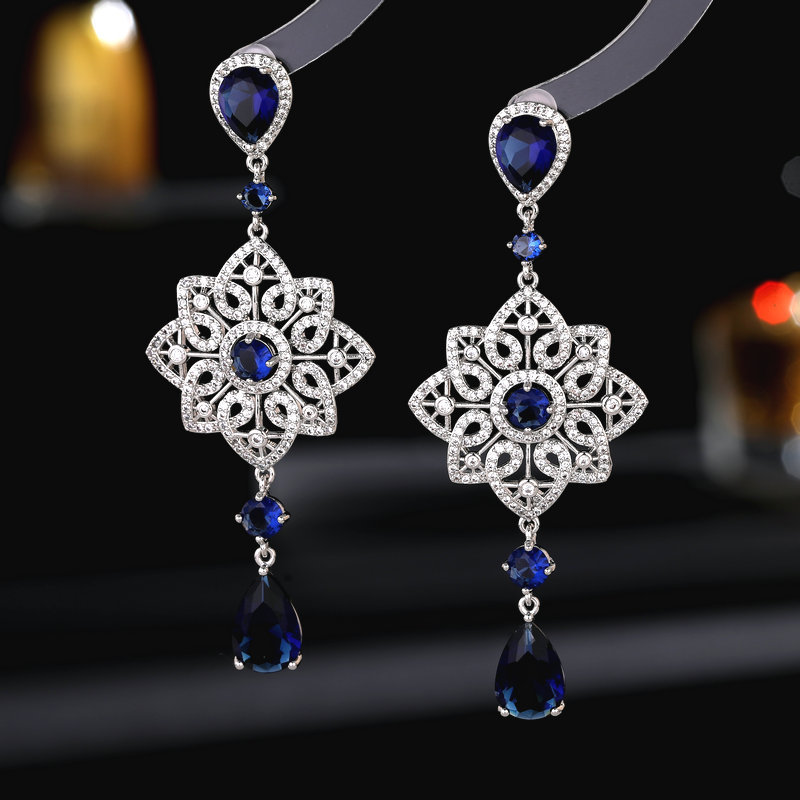 Light luxury high-end heavy industry earrings banquet dress with long hollow pattern water drop earrings_voghion.com