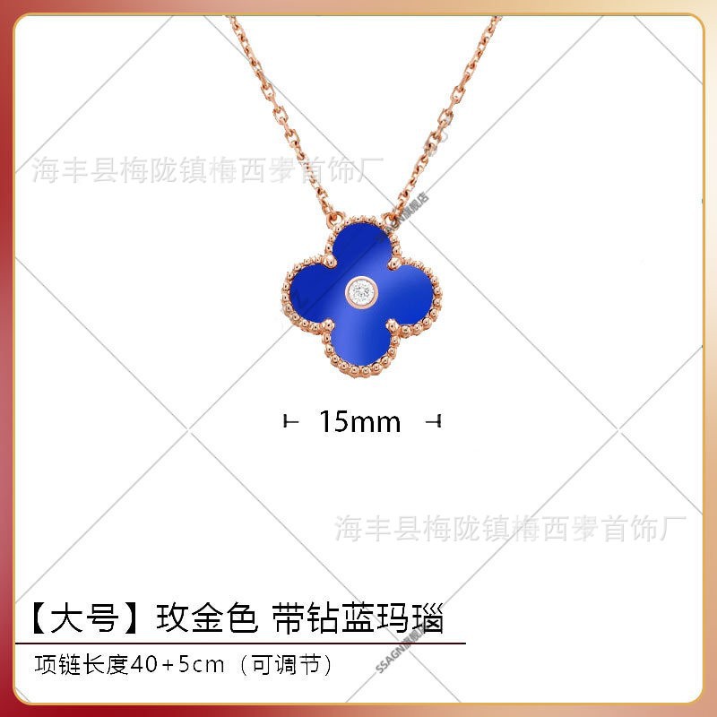 Large four-leaf clover necklace in rose gold and blue agate with diamonds in the middle