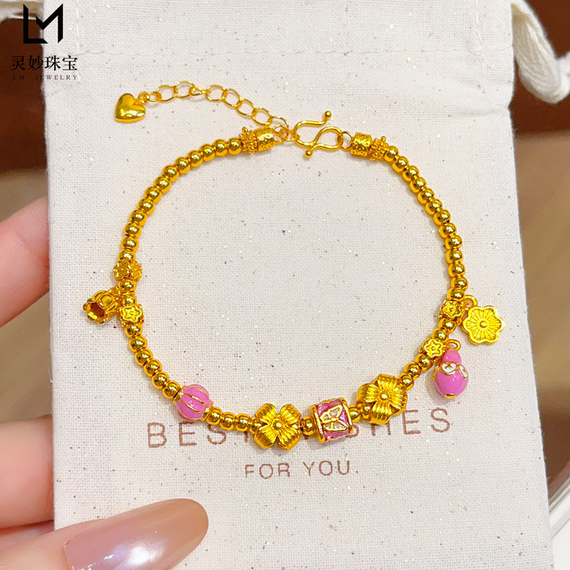 Antique-style gold-plated enamel powder flower and butterfly bead bracelet with lily of the valley tassels, a delicate and luxurious piece of jewelry, perfect as a gift for women Antique-style gold-plated enamel powder flower and butterfly bead bracelet with lily of the valley tassels, a delicate and luxurious piece of jewelry, perfect as a gift for women