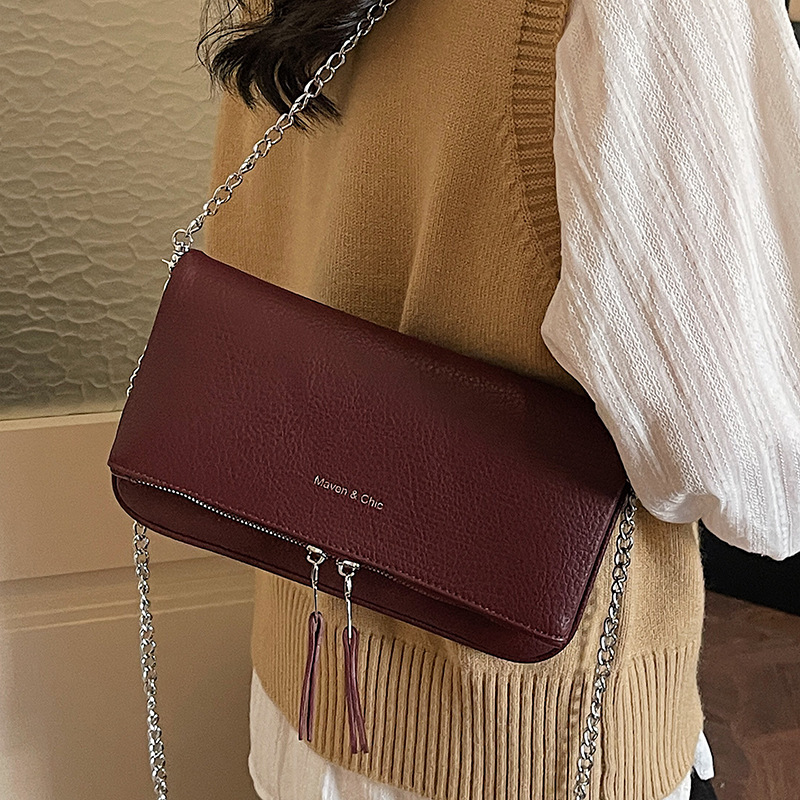 High-value fashion chain texture shoulder mochila 2026 primavera nueva bolsa casualizada coreana temperamento femenino
