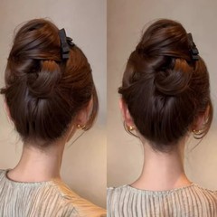 髪を砕いて神器の蝶結びを整理します。