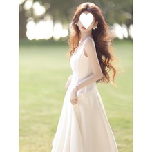 茶歇法式初恋白色吊带连衣裙女夏2024新款感气质海边度假长裙